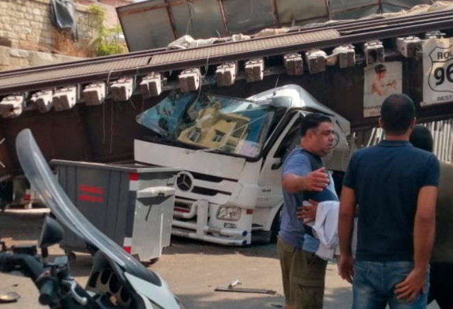 Truck causes railway bridge collapse in Mar Mikhael