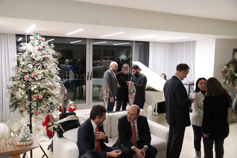 A  Christmas Gathering at Place Pasteur Project