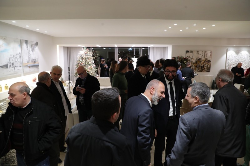 A  Christmas Gathering at Place Pasteur Project