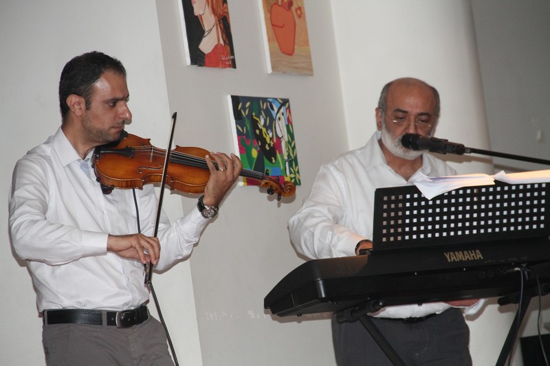 Malak Al Intizar a poetry night by Desiree Saccal