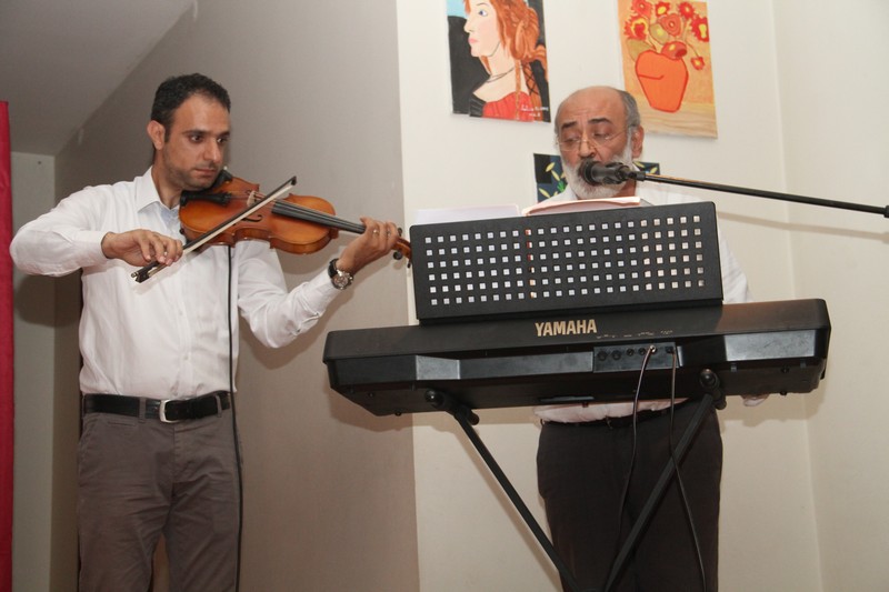 Malak Al Intizar a poetry night by Desiree Saccal