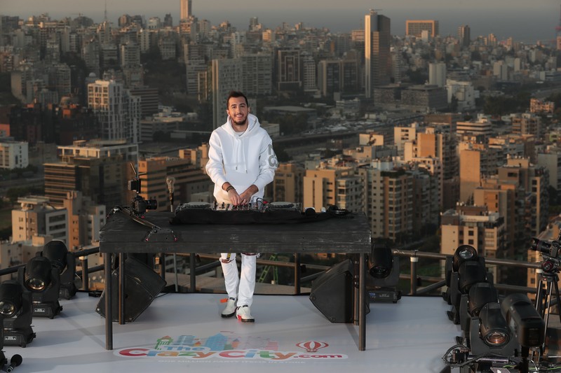 ANTHONY ABOU ANTOUN CONNECTS THE WORLD WITH LEBANON THROUGH MUSIC ON ONE OF THE HIGHEST TOWERS IN BEIRUT