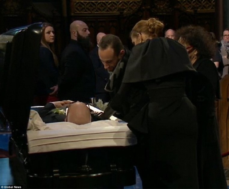 Celine Dion mourns husband René Angélil at open casket visitation