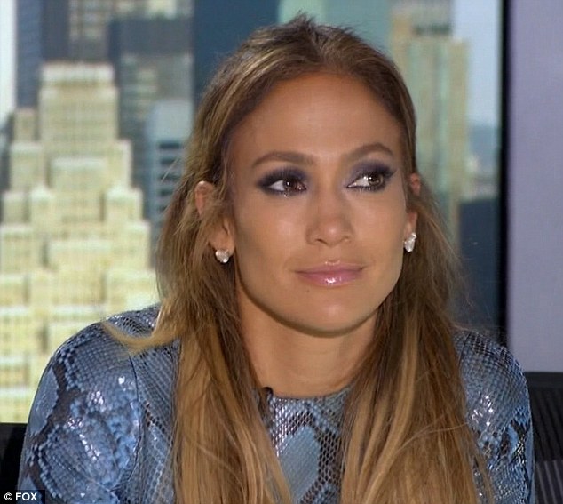 Jennifer Lopez wipes away tears live on tv, 