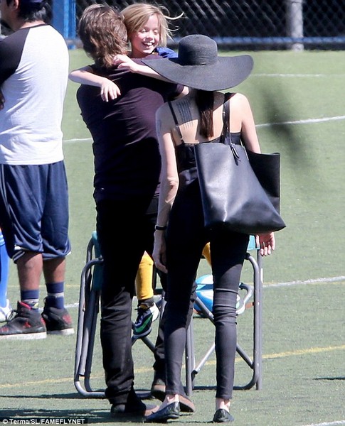 Angelina Jolie & Brad Pitt Share a Kiss at Shiloh & Zaharas Soccer Game