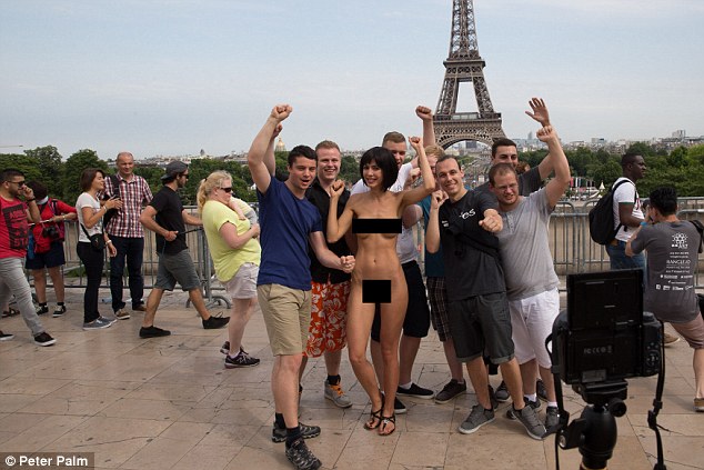 Model arrested after posing for NAKED selfies with tourists beside the Eiffel Tower