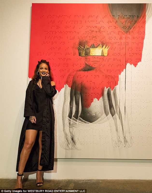 Rihanna oozes sex appeal as she unveils her long-awaited album cover