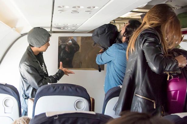 Angelina Jolie Brad Pitt and their six kids fly ECONOMY on a trip from Paris