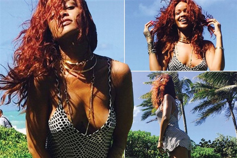 Rihanna poses for pictures on Hawaiian break 
