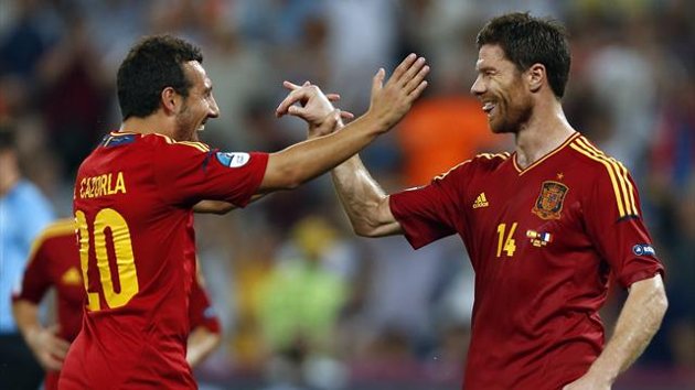 Xavi Alonso sends Spain into semis