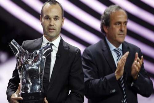 Iniesta edges Messi and Ronaldo to UEFA award