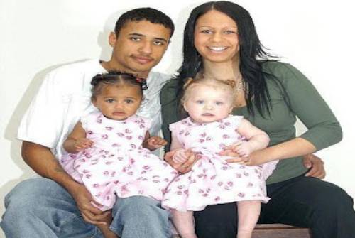 Twin sisters but completely different races