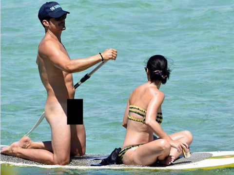 Orlando Bloom goes paddleboarding naked with Katy Perry