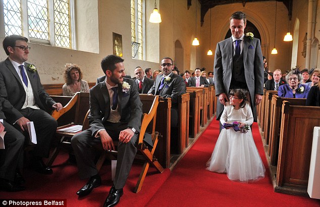 Flower girl takes her first steps thanks to dad