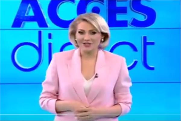 In Video: A topless woman enters a studio and attacks an anchor on the air