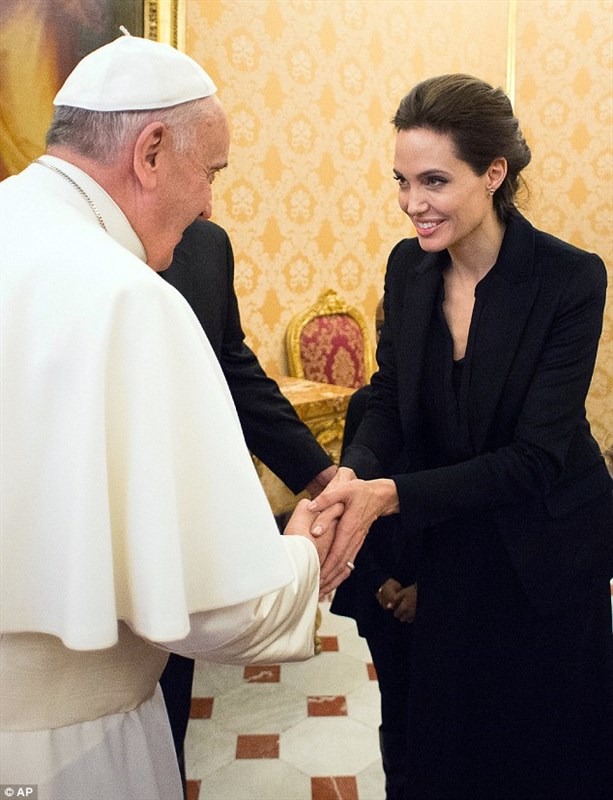 Angelina Jolie meets Pope Francis during a private audience at the Vatican after screening of her movie Unbroken