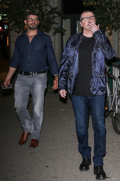 George Michael spotted on rare outing with boyfriend Fadi Fawaz