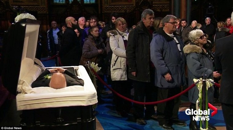 Celine Dion mourns husband René Angélil at open casket visitation