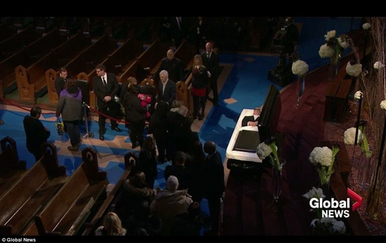 Celine Dion mourns husband René Angélil at open casket visitation