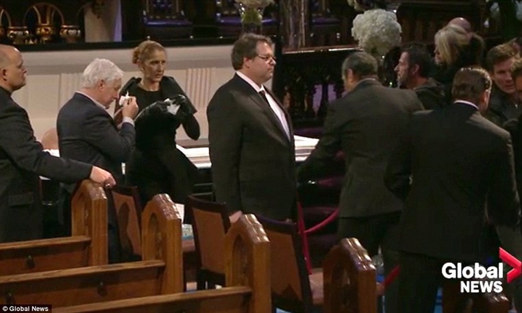Celine Dion mourns husband René Angélil at open casket visitation