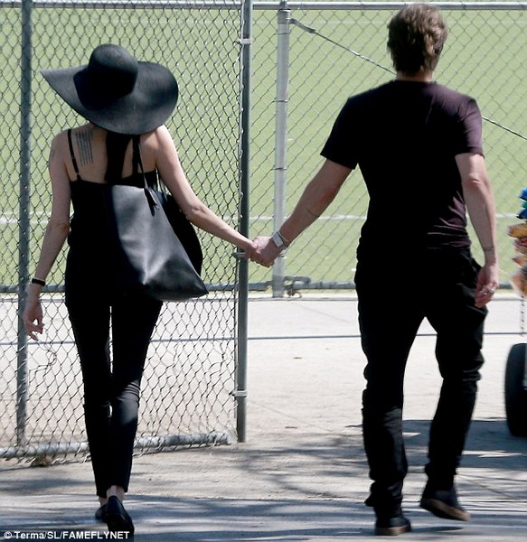 Angelina Jolie & Brad Pitt Share a Kiss at Shiloh & Zaharas Soccer Game