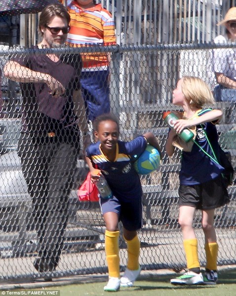 Angelina Jolie & Brad Pitt Share a Kiss at Shiloh & Zaharas Soccer Game