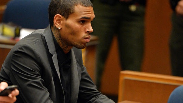 Singer Chris Brown arrested for pointing gun at woman