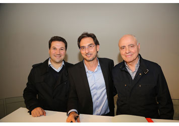 Elio Sassine signs his book “One Flew Over the Cuckoo’s Land”