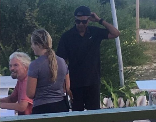Barack Obama Wears Backwards Hat on Vacation with Michelle