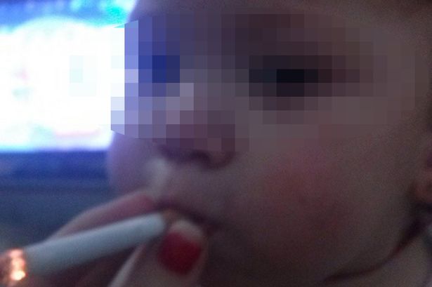 Woman Sparks Outrage With Instagram Photo Of A Baby Smoking 