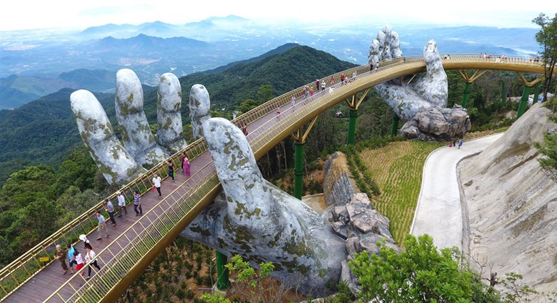 Vietnam bridge: Walking through a god's hands