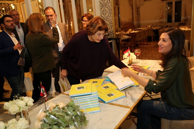Marie-Noelle Fattal signs her book Beirut Footsteps at Liza restaurant.