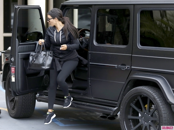 Kim Kardashian goes make-up free as she hits the gym