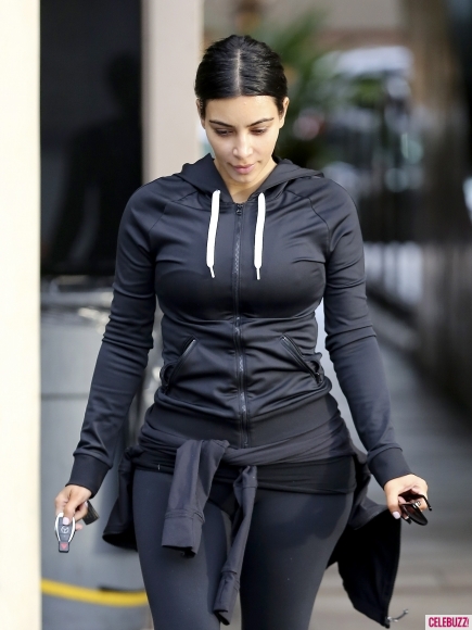 Kim Kardashian goes make-up free as she hits the gym