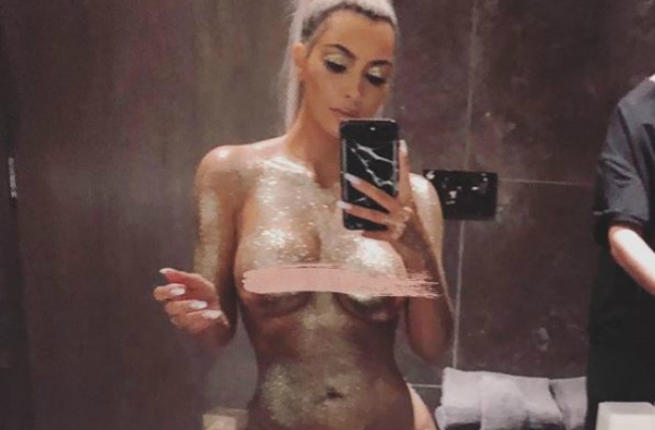 Kim Kardashian goes naked covered in shimmering glitter 