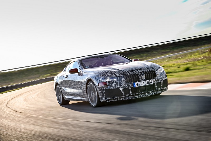The new BMW 8 Series Coupe undergoes vehicle dynamics testing on the racetrack.
