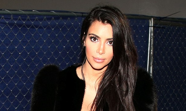 Kim Kardashian Bends Over and Flashes Her Bare Butt for Love Magazine