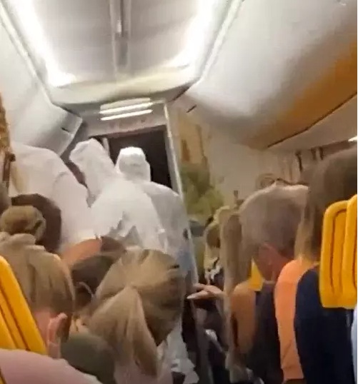Man Removed From Ryanair Flight By Workers In Hazmat Suits After Testing Positive For Coronavirus