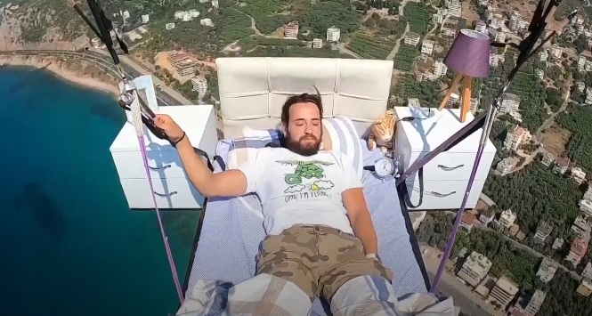 In Video: Guy Goes Paragliding While In His Bed