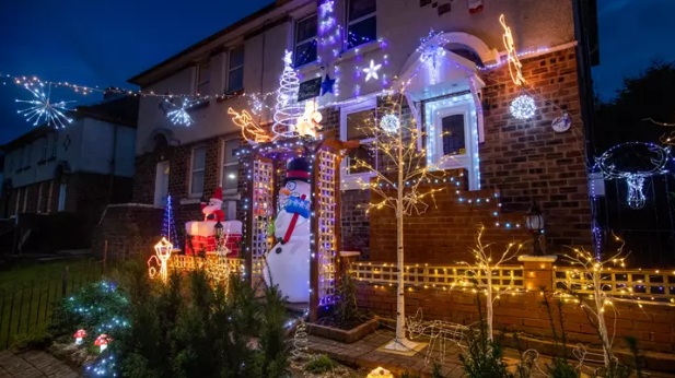 Couple Put Up Christmas Lights Two Months Early To 'Cheer People Up' During Pandemic