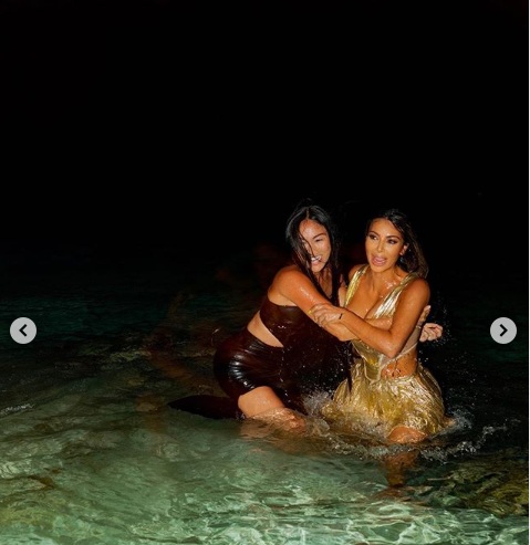 Photos and video of Kim Kardashian dancing at the beach with her sister and girlfriends