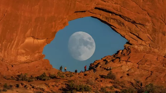 In Pictures: Full Moon Looks Like Giant Eye In Stunning Rock Arch Photograph