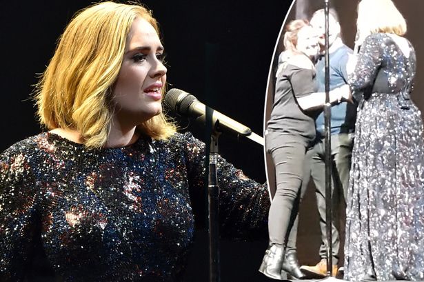 Adele stops performance to invite couple on stage after seeing him proposing in the audience