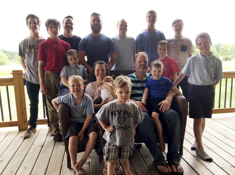 After 14 Boys Michigan Couple Welcomes First Baby Girl To The Family