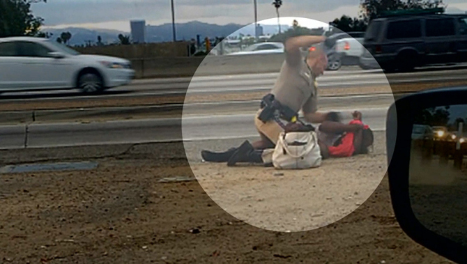 Woman beaten by police officer