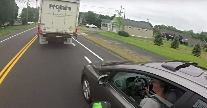 Wish we could do this in Lebanon! Biker gets instant revenge on car that cut him off