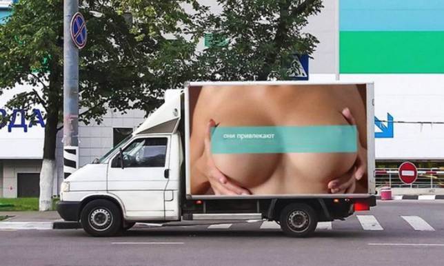 Advert of woman s breasts posted on side of van causes 500 car crashes in just 24 hours