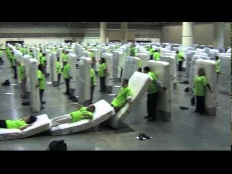 Human mattress dominoes attempt breaks world record 