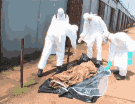 Incredible Moment Funeral Workers Realise Dead Ebola Victim Is Alive 