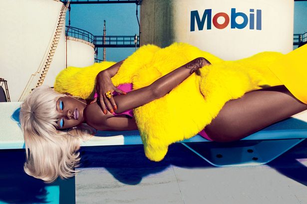 Rihanna poses TOPLESS and wears blonde wig for new photoshoot